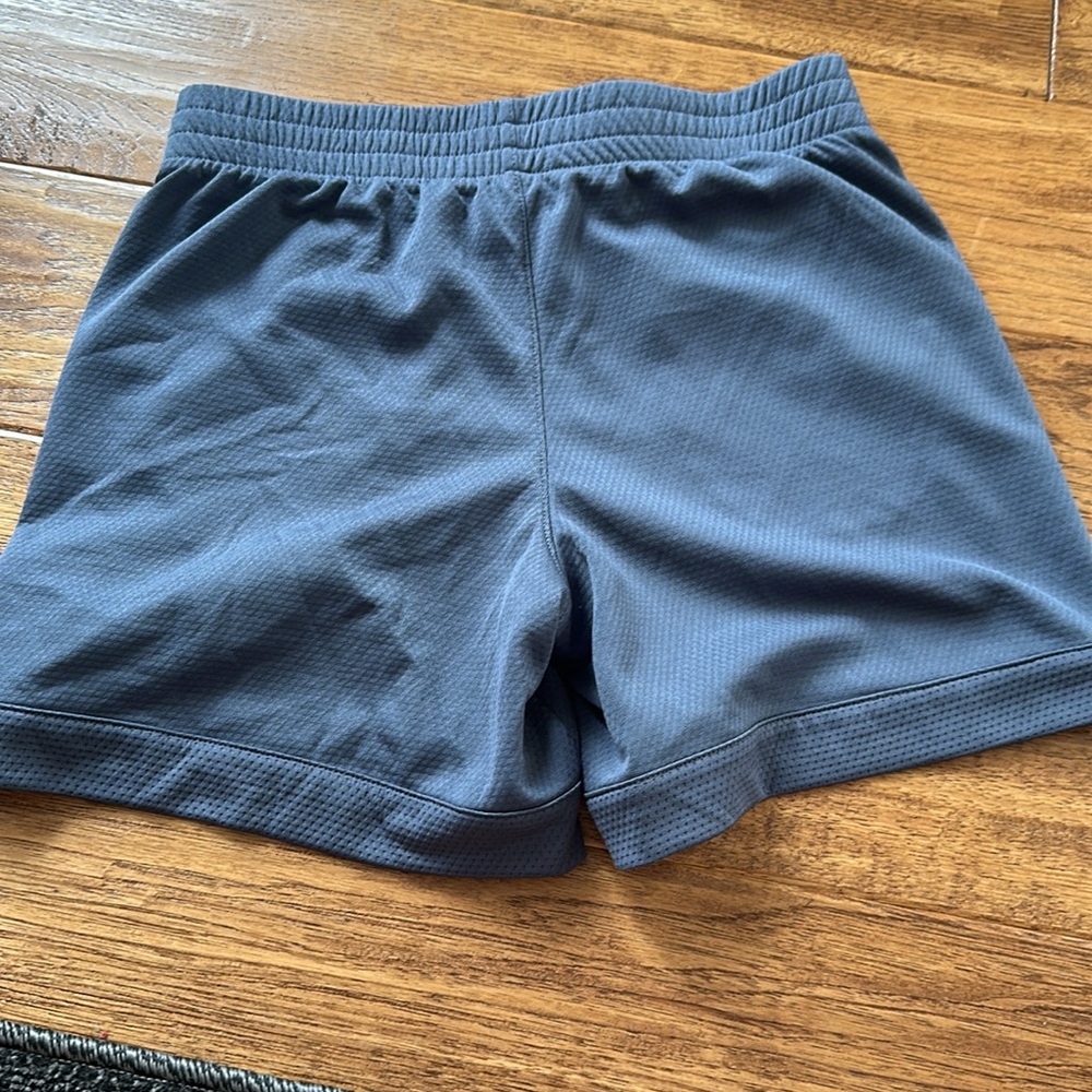Girls Athletic shorts Size L (10/12) with pockets. Small snag on front. - Picture 2 of 3